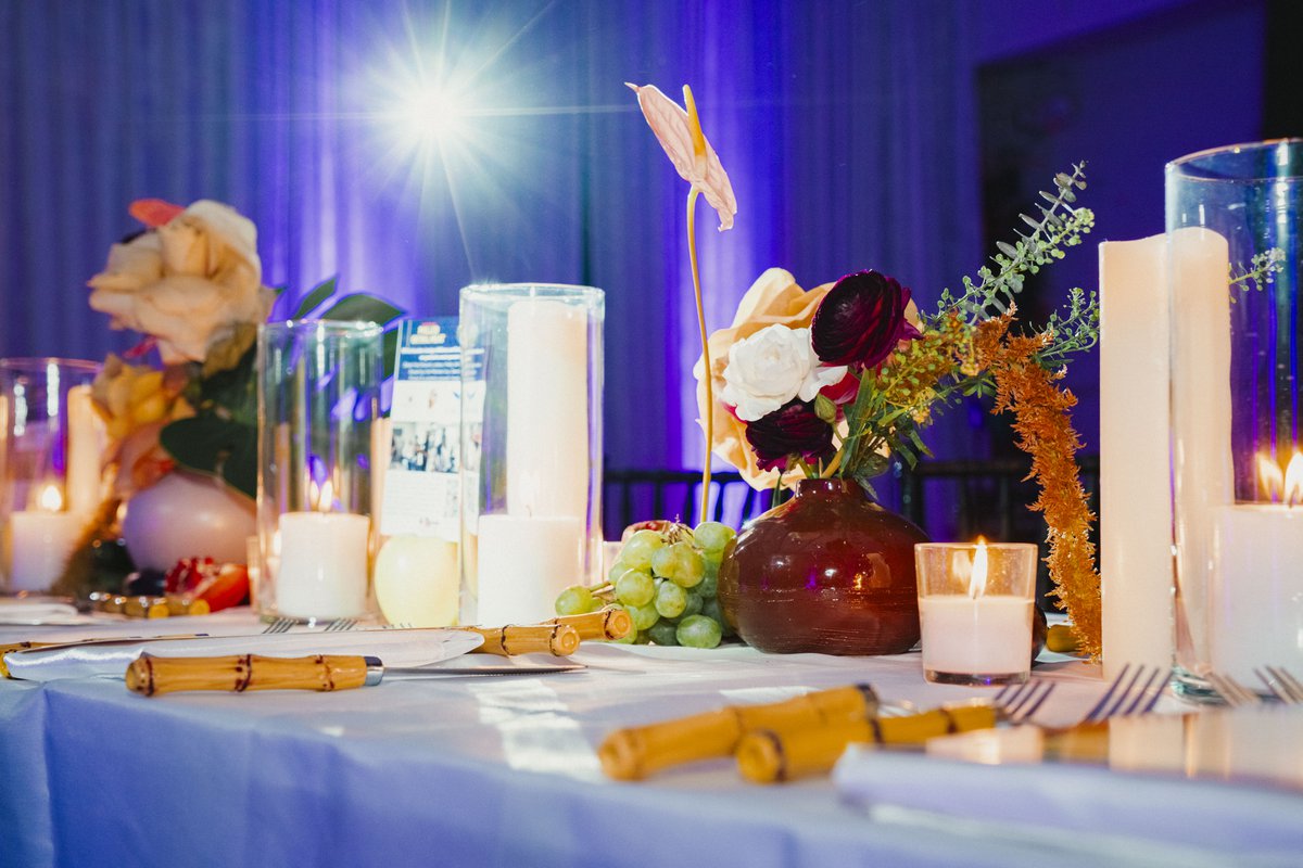 Candlelit tablescape styled and shot on location at a client event