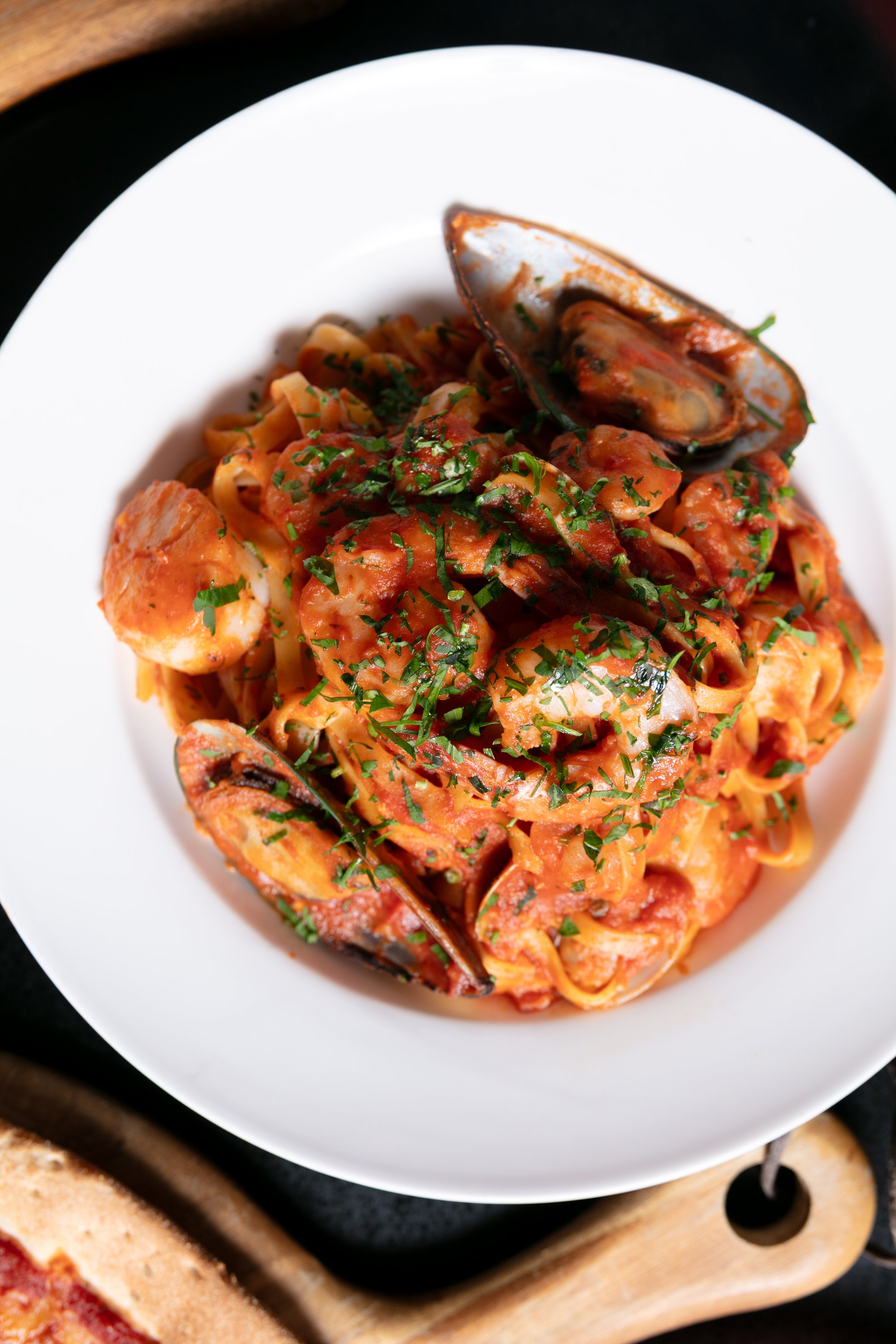 Seafood marinara pasta with mussels and prawns in a rich tomato sauce